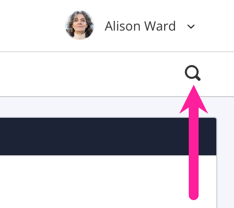 Close up of top-right corner of Paligo editor. A callout arrow points to the magnifying glass search icon just below the profile avatar.